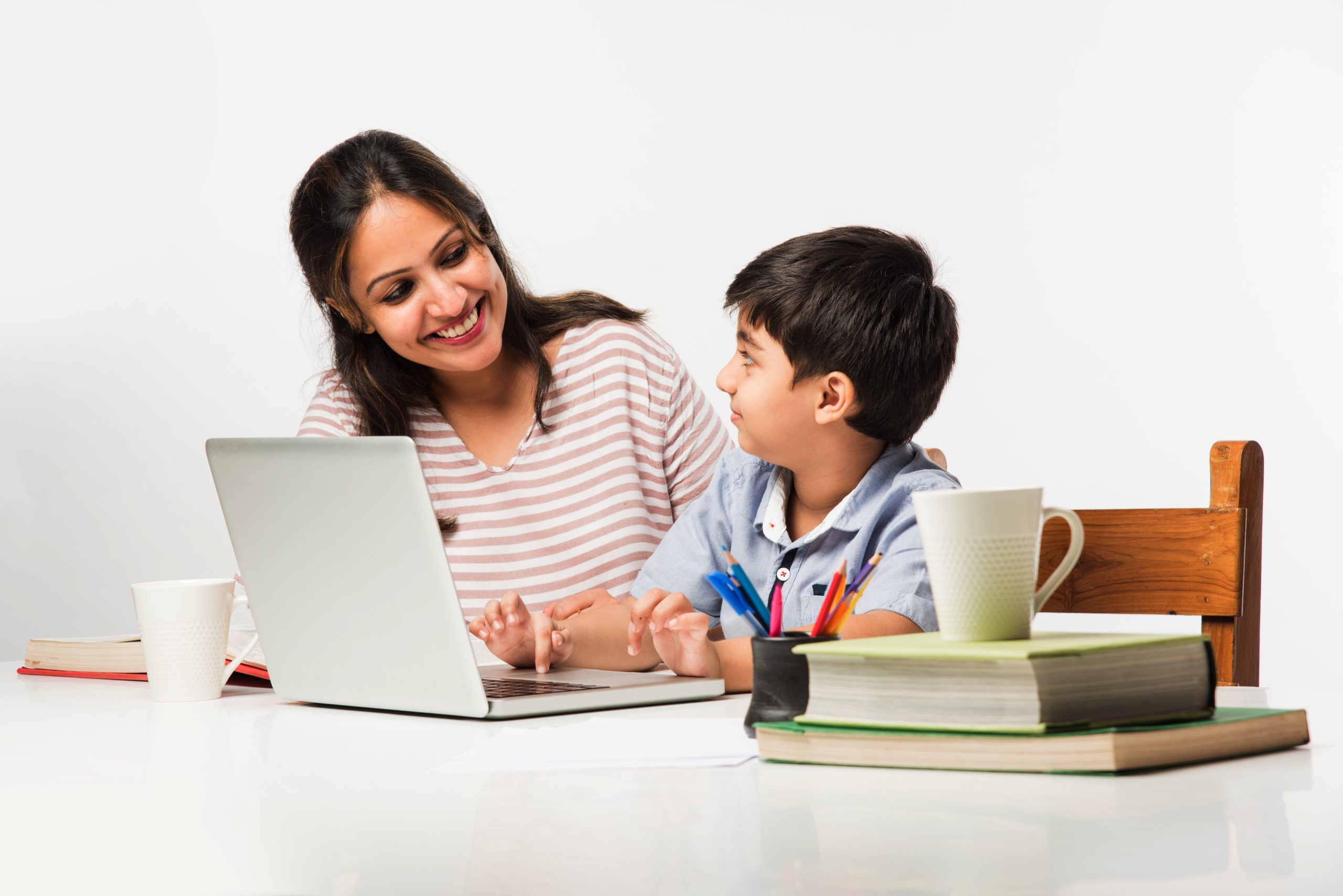 Cute,Indian,Boy,With,Mother,Doing,Homework,At,Home,Using